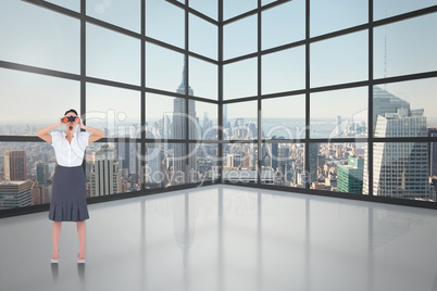 Composite image of shocked elegant businesswoman looking through