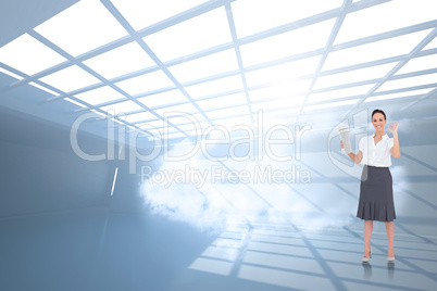 Composite image of stylish businesswoman making gesture while ho