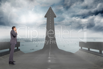 Composite image of thinking businessman with hand on chin Composite image of thinking businessman with hand on chin