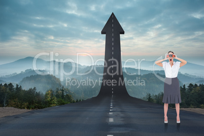 Composite image of shocked elegant businesswoman looking through