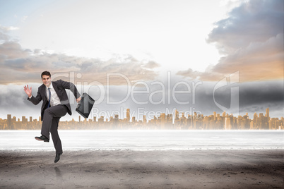 Composite image of happy businessman in a hury