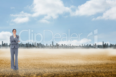 Composite image of smiling saleswoman in thoughts