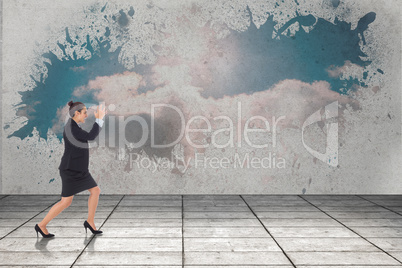 Composite image of angry businesswoman gesturing