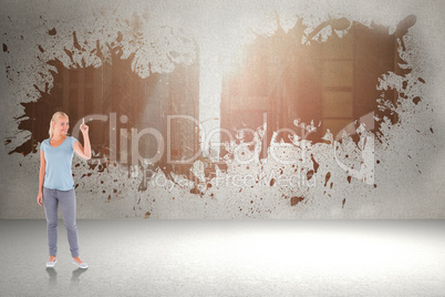 Composite image of charming woman pointing