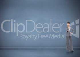 Composite image of attractive businesswoman holding tablet pc