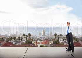 Composite image of thinking businessman touching chin