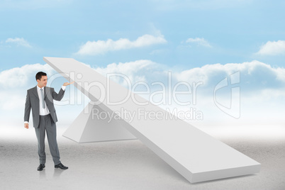 Composite image of businessman looking at what he is presenting Composite image of businessman looking at what he is presenting