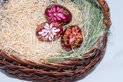 Easter egg in basket.