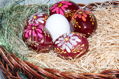 Easter egg in basket.