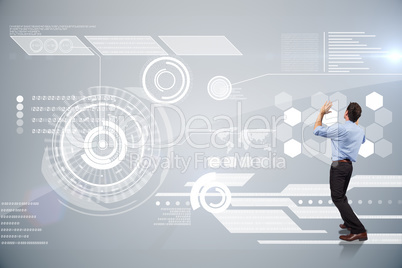 Composite image of businessman posing with arms up