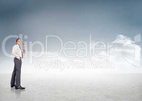 Composite image of thinking businessman holding glasses