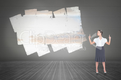 Composite image of content gorgeous businesswoman posing