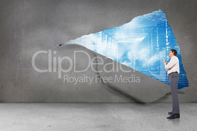 Composite image of thinking businessman holding pen