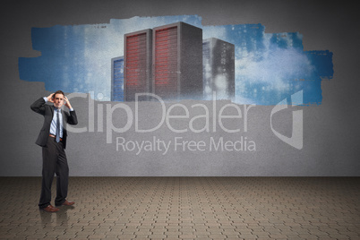 Composite image of stressed businessman with hands on head