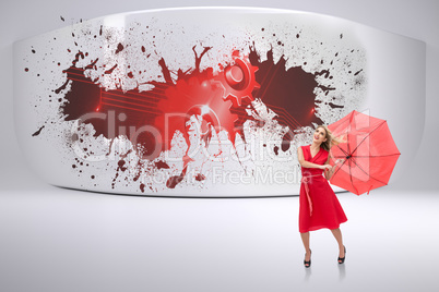 Composite image of elegant blonde holding umbrella