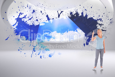 Composite image of charming woman pointing