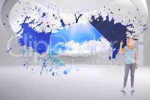 Composite image of charming woman pointing