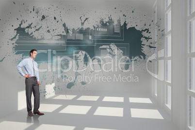 Composite image of smiling businessman with hand on hip