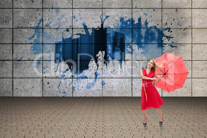 Composite image of elegant blonde holding umbrella