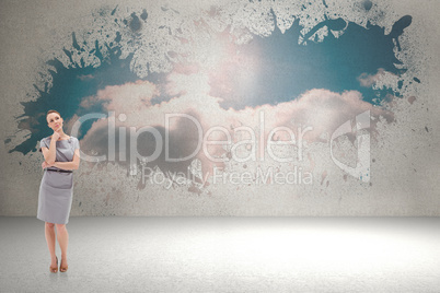 Composite image of thoughtful woman posing in dress Composite image of thoughtful woman posing in dress