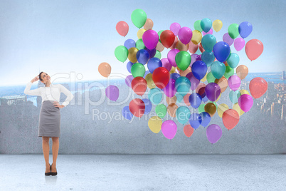 Composite image of smiling thoughtful businesswoman