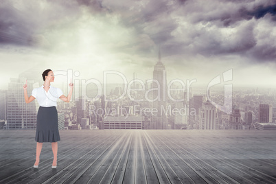 Composite image of content gorgeous businesswoman posing