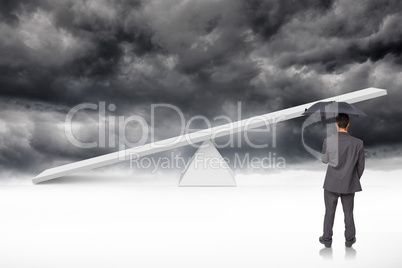 Composite image of rear view of classy businessman holding grey