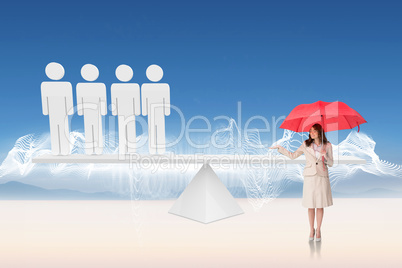 Composite image of attractive businesswoman holding red umbrella