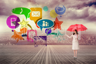 Composite image of attractive businesswoman holding red umbrella