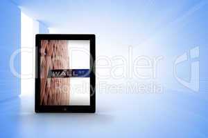 Composite image of wall street on tablet screen