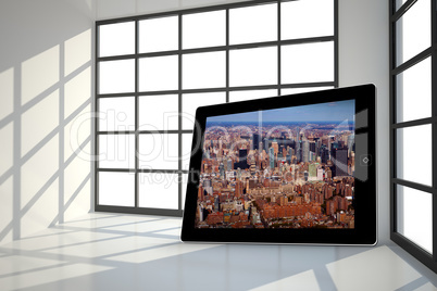 Composite image of new york on tablet screen