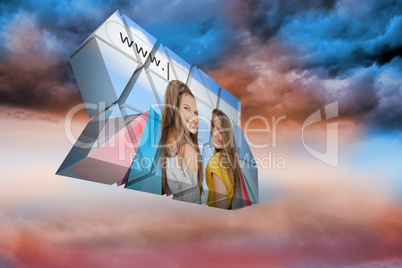 Composite image of girls shopping on abstract screen