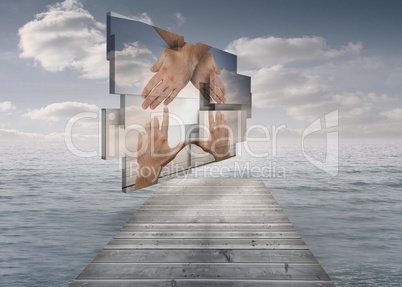 Composite image of hands making a house on abstract screen