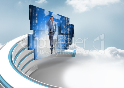 Composite image of businessman in data center on abstract screen