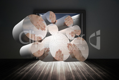 Composite image of united hands on abstract screen