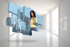 Composite image of student using tablet on abstract screen