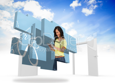 Composite image of student using tablet on abstract screen
