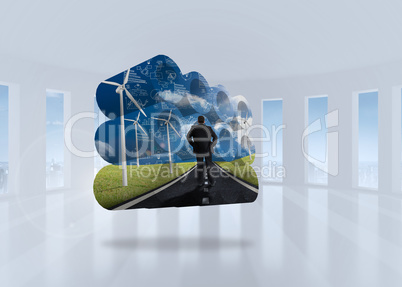 Composite image of businessman on road on abstract screen