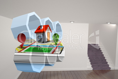 Composite image of house on a map on abstract screen