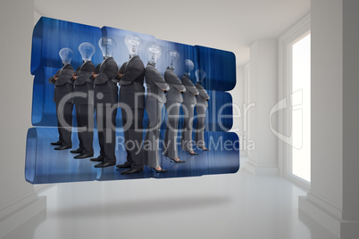 Composite image of light bulb business people on abstract screen