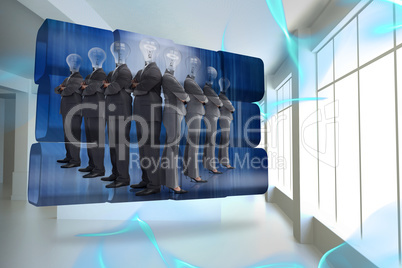 Composite image of light bulb business people on abstract screen Composite image of light bulb business people on abstract screen