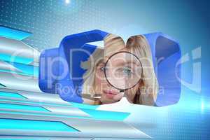 Composite image of blonde holding magnifying glass on abstract s