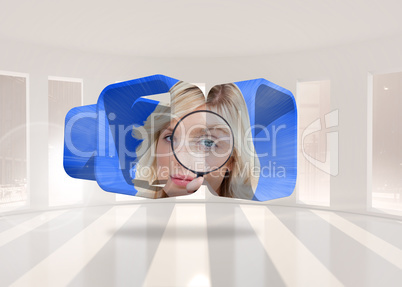 Composite image of blonde holding magnifying glass on abstract s