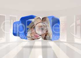 Composite image of blonde holding magnifying glass on abstract s