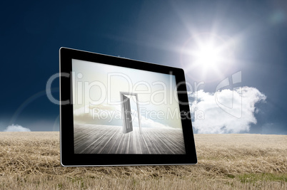 Composite image of open door on tablet screen