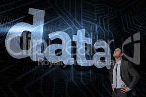Data against futuristic black and blue background