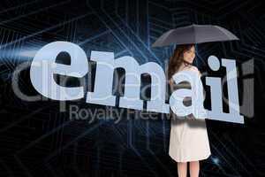 Businesswoman holding umbrella behind the word email