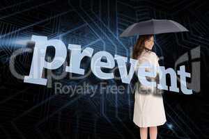 Businesswoman holding umbrella behind the word prevent