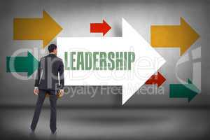 Leadership against arrows pointing