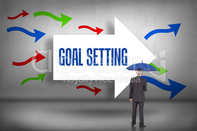 Goal setting against arrows pointing